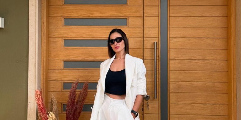 أجمل إطلالات المصممة آن رفاعي زوجة كريم محمود عبد العزيز.. هكذا تمزج الأزياء الرسمية باللمسات العصرية